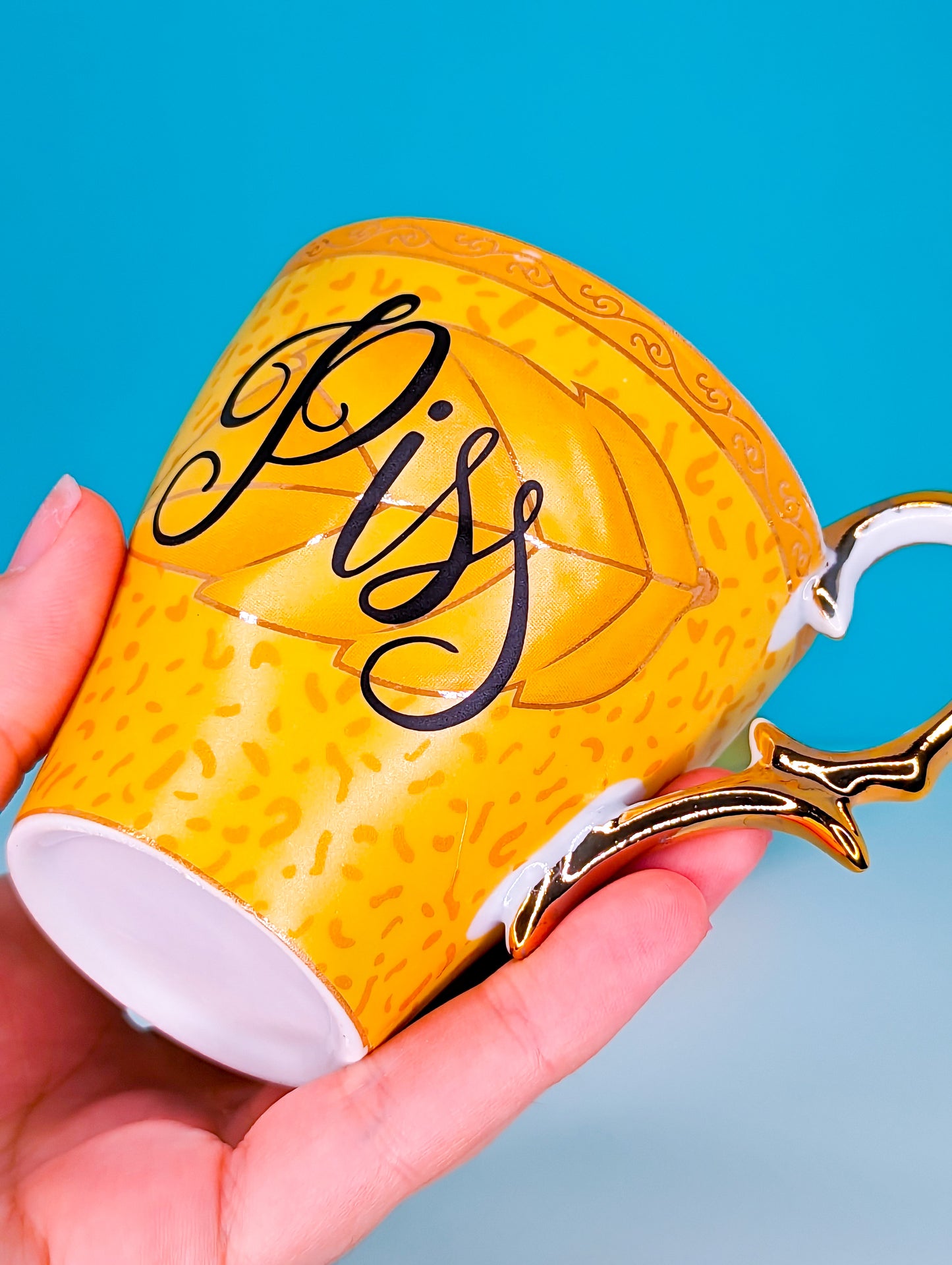 Piss teacup set